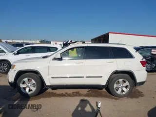 2011 Jeep Grand Cherokee Laredo with VIN 1J4RR4GG4BC703071, listed as a IAAI auction lot 41992878 with 126,199 mi miles and . Bid and sale history available at DreamBid. Image 14.
