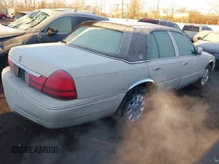 2003 Mercury Grand Marquis LS Premium with VIN 2MEHM75W53X704387, listed as a IAAI auction lot 41838775 with 312,869 mi miles and . Bid and sale history available at DreamBid. Image 4.