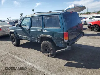 1997 Jeep Cherokee Sport with VIN 1J4FT68S4VL545385, listed as a Copart auction lot 49616325 with 239,798 mi miles and Salvage Title. Bid and sale history available at carsss.com. Image 2.
