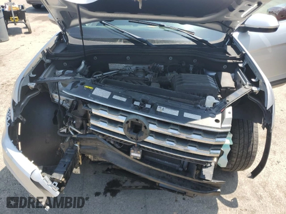 2018 Volkswagen Atlas SE with VIN 1V2LR2CA6JC577519, listed as a Copart auction lot 61823185 with 143,254 mi miles and Salvage title. Bid and sale history available at DreamBid. Image 12.