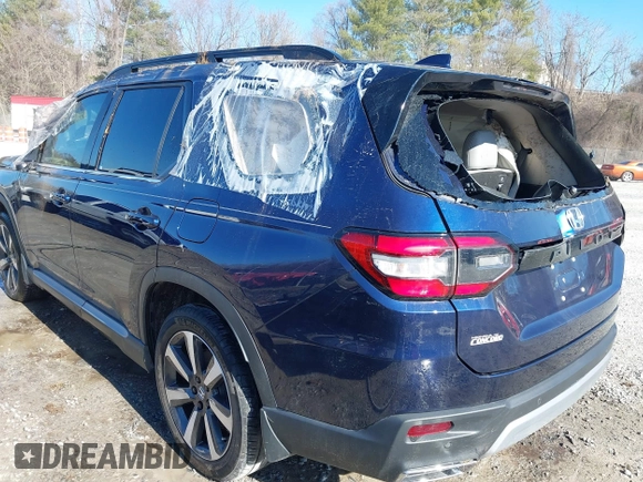 2023 Honda Pilot Touring with VIN 5FNYG2H77PB013559, listed as a IAAI auction lot 41620387 with 59,721 mi miles. Bid and sale history available at carsss.com. Image 3.