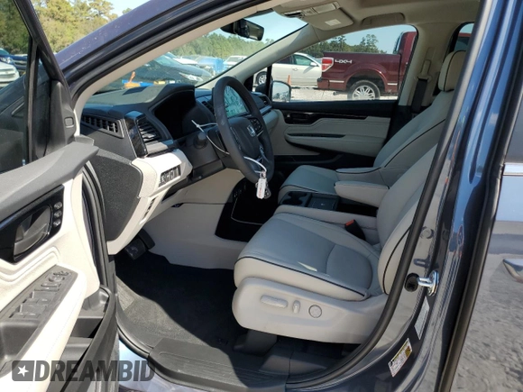 2025 Honda Odyssey Touring с VIN 5FNRL6H87SB011464, выставлен на аукционе Copart как лот 76591844 с пробегом 627 миль миль и Списание • Salvage title. История ставок и продаж доступна на DreamBid. Изображение 7.