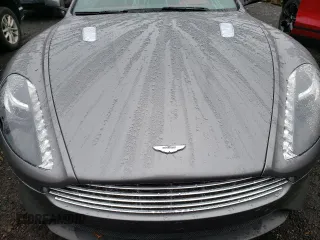 2015 Aston Martin DB9 z VIN SCFFDAEM9FGA16279, wystawiony jako Copart lot #81886554 z przebiegiem 25 029 mil mil oraz Szkody całkowita. Historia ofert i sprzedaży dostępna na DreamBid. Obrazek 11.