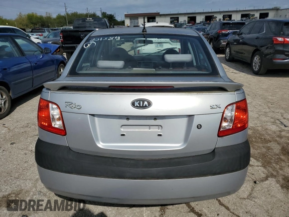 2007 Kia Rio LX with VIN KNADE123776231384, listed as a Copart auction lot 73554084 with 0 mi miles and Salvage Title. Bid and sale history available at carsss.com. Image 6.