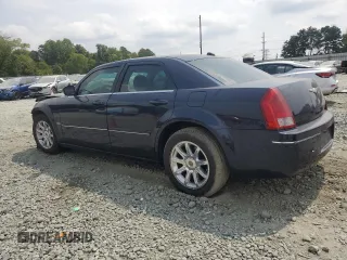 2005 Chrysler 300 with VIN 2C3AA53G05H589338, listed as a Copart auction lot 69333264 with 153,488 mi miles and Salvage Title. Bid and sale history available at carsss.com. Image 2.