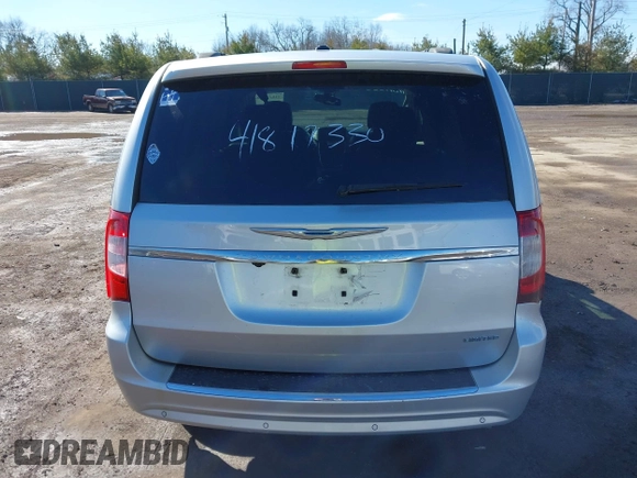 2011 Chrysler Town & Country Limited z VIN 2A4RR6DG1BR609818, wystawiony jako IAAI lot #41817330 z przebiegiem 160 482 mil mil oraz . Historia ofert i sprzedaży dostępna na DreamBid. Obrazek 17.