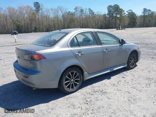 2017 Mitsubishi Lancer ES with VIN JA32U2FU1HU007318, listed as a IAAI auction lot 41908084 with 159,564 mi miles. Bid and sale history available at carsss.com. Image 4.