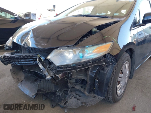 2010 Honda Insight LX with VIN JHMZE2H54AS021815, listed as a IAAI auction lot 42259951 with 137,436 mi miles and . Bid and sale history available at DreamBid. Image 14.