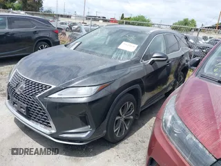 2020 Lexus RX with VIN JTJHZKEA3L2016365, listed as a IAAI auction lot 41615430 with 33,853 mi miles. Bid and sale history available at carsss.com. Image 2.