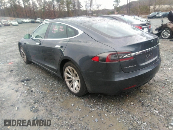 2016 Tesla Model S 70 with VIN 5YJSA1E13GF174542, listed as a IAAI auction lot 41169279 with 72,691 mi miles and . Bid and sale history available at DreamBid. Image 3.