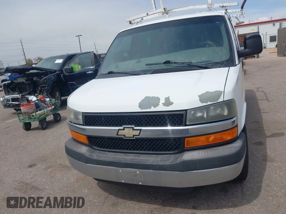 2012 Chevrolet Express Cargo Van with VIN 1GCWGFCA7C1121989, listed as a IAAI auction lot 42118853 with 214,478 mi miles. Bid and sale history available at carsss.com. Image 12.