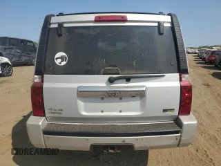 2007 Jeep Commander Limited with VIN 1J8HG58P87C595890, listed as a Copart auction lot 71123654 with 148,438 mi miles and Salvage Title. Bid and sale history available at carsss.com. Image 6.