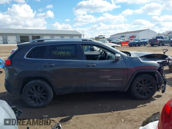 2015 Jeep Cherokee Limited with VIN 1C4PJMDB7FW591772, listed as a IAAI auction lot 41684106 with 118,708 mi miles and . Bid and sale history available at DreamBid. Image 13.