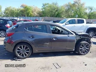 2018 Mazda 3 Touring with VIN 3MZBN1L34JM164952, listed as a IAAI auction lot 42179420 with 106,706 mi miles and . Bid and sale history available at DreamBid. Image 13.