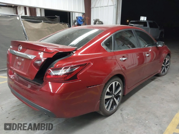 2018 Nissan Altima SR with VIN 1N4AL3AP4JC120138, listed as a IAAI auction lot 42111389 with 69,939 mi miles and . Bid and sale history available at carsss.com. Image 4.