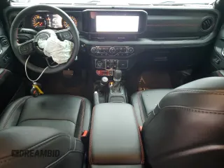 2024 Jeep Wrangler Rubicon X z VIN 1C4RJXFG5RW339591, wystawiony jako Copart lot #50061185 z przebiegiem 3 056 mil mil oraz Szkoda całkowita • Salvage title. Historia ofert i sprzedaży dostępna na DreamBid. Obrazek 8.