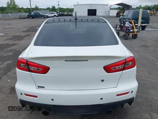 2013 Mitsubishi Lancer Evolution GSR z VIN JA32W8FV0DU023509, wystawiony jako IAAI lot #42222552 z przebiegiem 128 030 mil mil oraz . Historia ofert i sprzedaży dostępna na DreamBid. Obrazek 16.