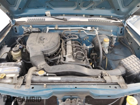 2002 Nissan Frontier XE with VIN 1N6DD26SX2C328602, listed as a Copart auction lot 81750784 with 127,820 mi miles and Salvage title. Bid and sale history available at DreamBid. Image 11.