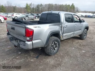 2019 Toyota Tacoma 4WD SR with VIN 5TFCZ5AN8KX168893, listed as a IAAI auction lot 41823745 with 146,557 mi miles. Bid and sale history available at carsss.com. Image 4.