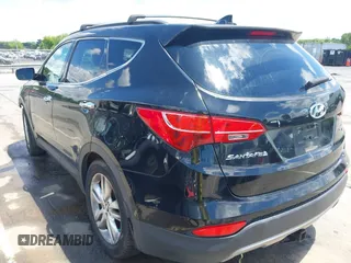 2013 Hyundai Santa Fe Sport z VIN 5XYZUDLA1DG050879, wystawiony jako IAAI lot #42236937 z przebiegiem 124 779 mil mil oraz . Historia ofert i sprzedaży dostępna na DreamBid. Obrazek 3.