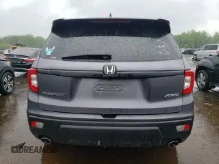2019 Honda Passport EX-L z VIN 5FNYF8H50KB028465, wystawiony jako Copart lot #56160545 z przebiegiem 100 636 mil mil oraz Szkoda całkowita • Salvage title. Historia ofert i sprzedaży dostępna na DreamBid. Obrazek 6.