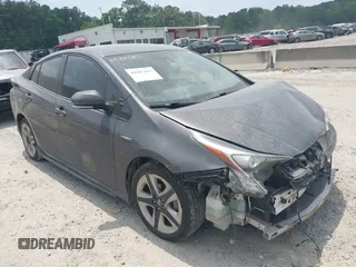 2017 Toyota Prius Two with VIN JTDKARFU0H3541998, listed as a IAAI auction lot 42407167 with 124,600 mi miles and . Bid and sale history available at DreamBid. Image 1.