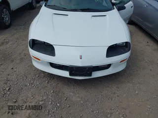 1994 Chevrolet Camaro z VIN 2G1FP22S5R2173095, wystawiony jako IAAI lot #42427396 z przebiegiem 95 713 mil mil oraz . Historia ofert i sprzedaży dostępna na DreamBid. Obrazek 6.