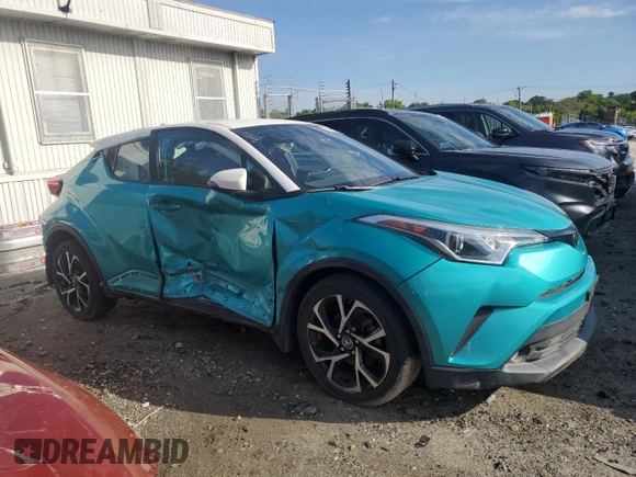 2018 Toyota C-HR XLE with VIN NMTKHMBX2JR041827, listed as a Copart auction lot 50443105 with 135,667 mi miles and Salvage title. Bid and sale history available at DreamBid. Image 4.