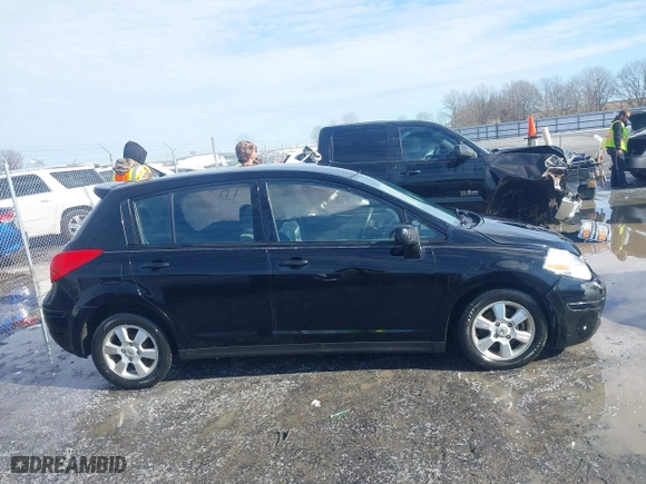 2012 Nissan Versa S with VIN 3N1BC1CP8CK271046, listed as a IAAI auction lot 41318997 with 138,111 mi miles. Bid and sale history available at carsss.com. Image 13.