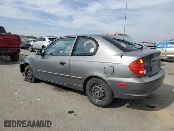 2004 Hyundai Accent GL with VIN KMHCG35C34U290855, listed as a Copart auction lot 70719664 with 176,210 mi miles and Salvage Title. Bid and sale history available at carsss.com. Image 2.