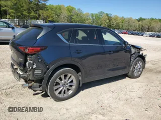 2019 Mazda CX-5 Grand Touring with VIN JM3KFBDMXK0540725, listed as a Copart auction lot 52395185 with 33,838 mi miles and Salvage Title. Bid and sale history available at carsss.com. Image 3.