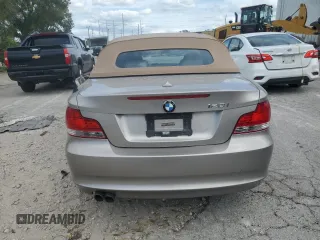 2009 BMW 1 Series 128i z VIN WBAUL73539VJ76952, wystawiony jako Copart lot #76992254 z przebiegiem Nie podano mil oraz Szkody całkowita. Historia ofert i sprzedaży dostępna na DreamBid. Obrazek 6.