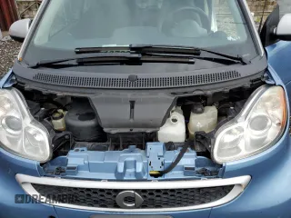 2013 Smart fortwo Pure z VIN WMEEJ3BA7DK599596, wystawiony jako Copart lot #73166994 z przebiegiem 110 919 mil mil oraz Szkoda całkowita • Salvage title. Historia ofert i sprzedaży dostępna na DreamBid. Obrazek 11.