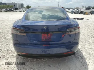 2021 Tesla Model S Long Range с VIN 5YJSA1E50MF452893, выставлен на аукционе Copart как лот 54139865 с пробегом 56 410 миль миль и Списание • Salvage title. История ставок и продаж доступна на DreamBid. Изображение 6.