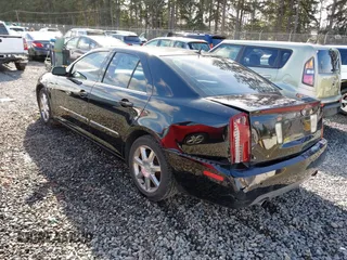 2005 Cadillac STS with VIN 1G6DW677250190268, listed as a IAAI auction lot 41702798 with 142,427 mi miles. Bid and sale history available at carsss.com. Image 3.