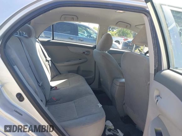 2009 Toyota Corolla with VIN JTDBL40E899057154, listed as a IAAI auction lot 42200165 with 200,545 mi miles and . Bid and sale history available at carsss.com. Image 8.