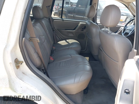 2004 Jeep Grand Cherokee Laredo with VIN 1J4GX48S94C222249, listed as a IAAI auction lot 42598242 with 196,745 mi miles and . Bid and sale history available at DreamBid. Image 8.