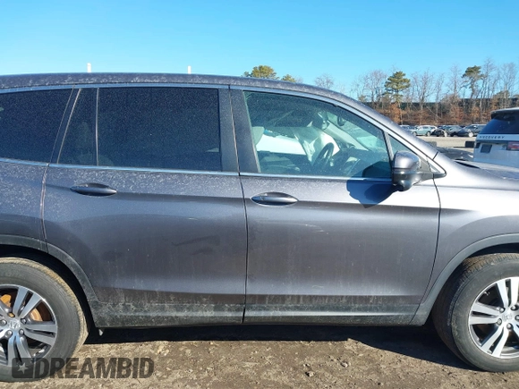 2017 Honda Pilot EX-L with VIN 5FNYF6H59HB101815, listed as a IAAI auction lot 41704661 with 130,479 mi miles and . Bid and sale history available at DreamBid. Image 13.