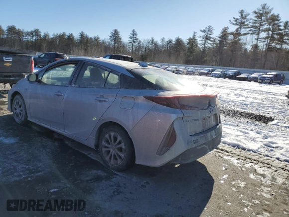 2021 Toyota Prius LE with VIN JTDKAMFP5M3193929, listed as a Copart auction lot 42902175 with 27,933 mi miles and Salvage Title. Bid and sale history available at DreamBid. Image 2.