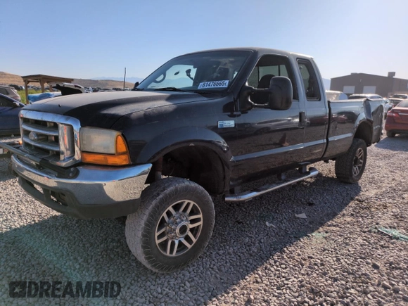 1999 Ford F-250 XL with VIN 1FTNX21FXXEC98957, listed as a Copart auction lot 61476665 with 414,070 mi miles and Salvage title. Bid and sale history available at DreamBid. Image 1.