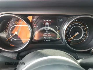 2021 Jeep Wrangler Unlimited Sport S with VIN 1C4HJXDGXMW785601, listed as a Copart auction lot 57342445 with 57,147 mi miles and Salvage title. Bid and sale history available at DreamBid. Image 9.