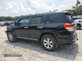 2013 Toyota 4Runner SR5 with VIN JTEZU5JR4D5052340, listed as a Copart auction lot 61809055 with 143,134 mi miles and Salvage title. Bid and sale history available at DreamBid. Image 2.