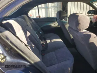 1997 Nissan Maxima GXE с VIN JN1CA21D5VT824575, выставлен на аукционе Copart как лот 85160034 с пробегом 94 387 миль миль и Списание • Salvage title. История ставок и продаж доступна на DreamBid. Изображение 10.