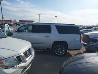 2020 GMC Yukon XL Denali with VIN 1GKS1HKJ6LR282854, listed as a IAAI auction lot 41717072 with 56,715 mi miles and . Bid and sale history available at DreamBid. Image 14.