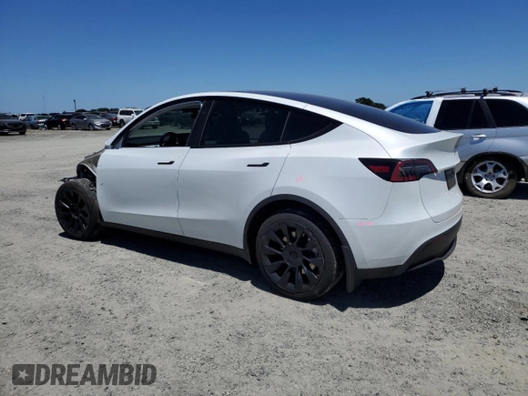 2024 Tesla Model Y Long Range with VIN 7SAYGDEE4RF054753, listed as a Copart auction lot 57989375 with 21,394 mi miles and Salvage title. Bid and sale history available at DreamBid. Image 2.