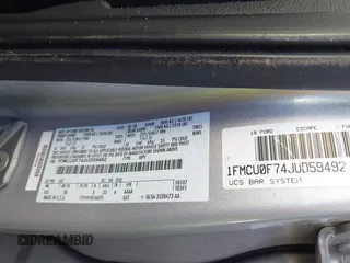 2018 Ford Escape S z VIN 1FMCU0F74JUD59492, wystawiony jako IAAI lot #41759424 z przebiegiem Nie podano mil oraz . Historia ofert i sprzedaży dostępna na DreamBid. Obrazek 9.
