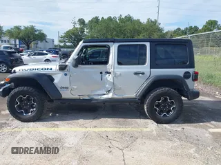 2023 Jeep Wrangler Rubicon with VIN 1C4JJXR63PW703424, listed as a IAAI auction lot 42639653 with 46,412 mi miles and . Bid and sale history available at DreamBid. Image 13.