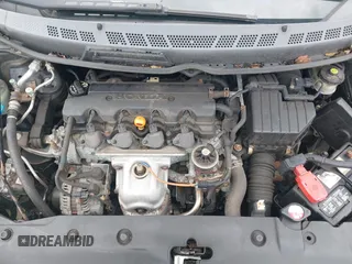 2010 Honda Civic Cpe LX with VIN 2HGFG1B65AH506256, listed as a IAAI auction lot 41942862 with 142,683 mi miles. Bid and sale history available at carsss.com. Image 10.