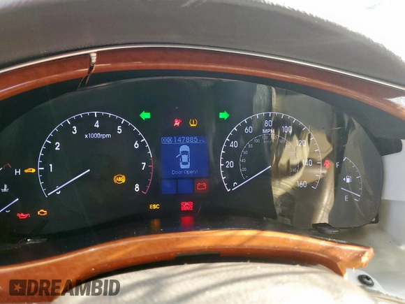 2013 Hyundai Genesis 3.8L z VIN KMHGC4DD3DU220138, wystawiony jako Copart lot #58619845 z przebiegiem 147 885 mil mil oraz Szkoda całkowita • Salvage title. Historia ofert i sprzedaży dostępna na DreamBid. Obrazek 9.