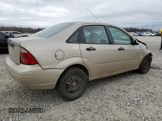2007 Ford Focus S with VIN 1FAFP34N07W242359, listed as a Copart auction lot 61677025 with 164,445 mi miles and Salvage title. Bid and sale history available at DreamBid. Image 3.